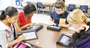 STEM-students-using-iPads-300x182.jpg